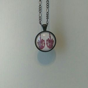 Skeleton hands necklace.